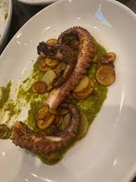 Battello signature dishes Grilled OctopusRicotta GnocchiBranzino